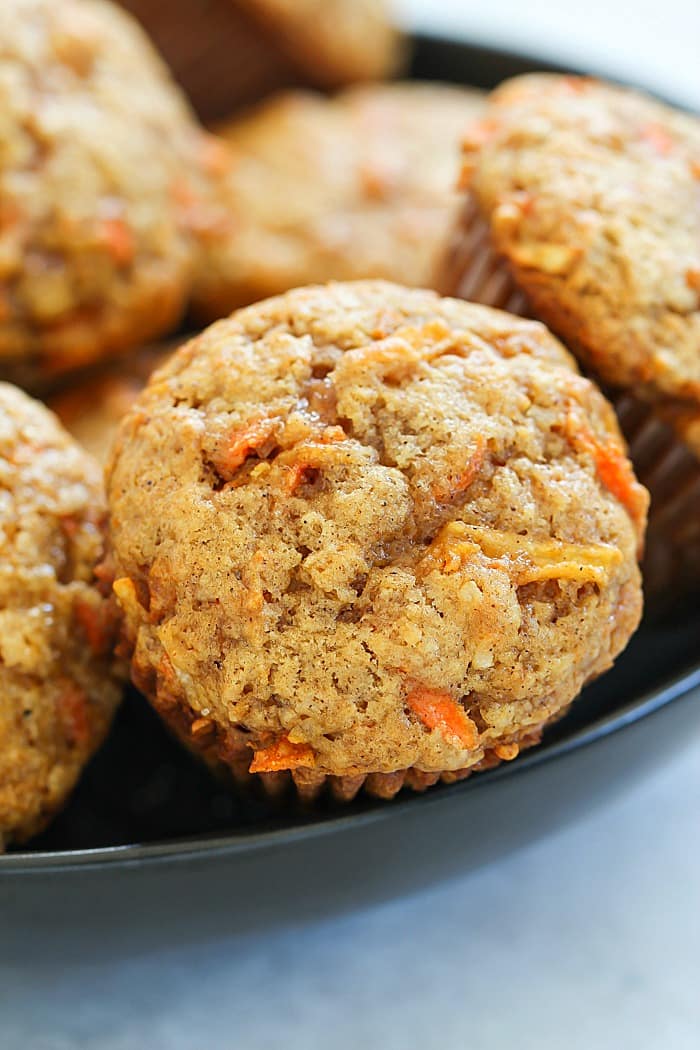 These Apple Carrot Muffins (also known as Sunshine Muffins) are full of carrots, apples, coconut, cinnamon & nutmeg. Your house will smell amazing!