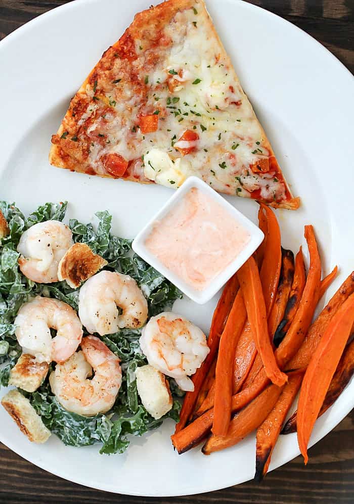 Making healthy side dishes doesn't have to be hard or take a lot of time! Try these 2 easy side dishes: Baked Sweet Potato Fries (with a yummy Sriracha dipping sauce) and Shrimp Kale Caesar Salad! They're ready in no time! AD