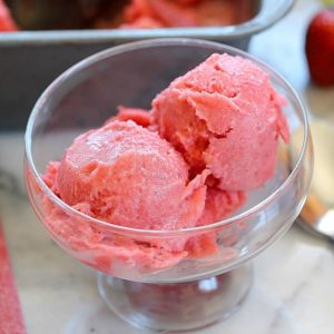 Get ready for the best summertime dessert! This Strawberry Sorbet Recipe is easy to make, healthier than most desserts and absolutely delicious!