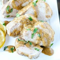 Get ready to WOW your family or guests with this incredibly tender and juicy baked pork tenderloin recipe with marinade sauce! #AD