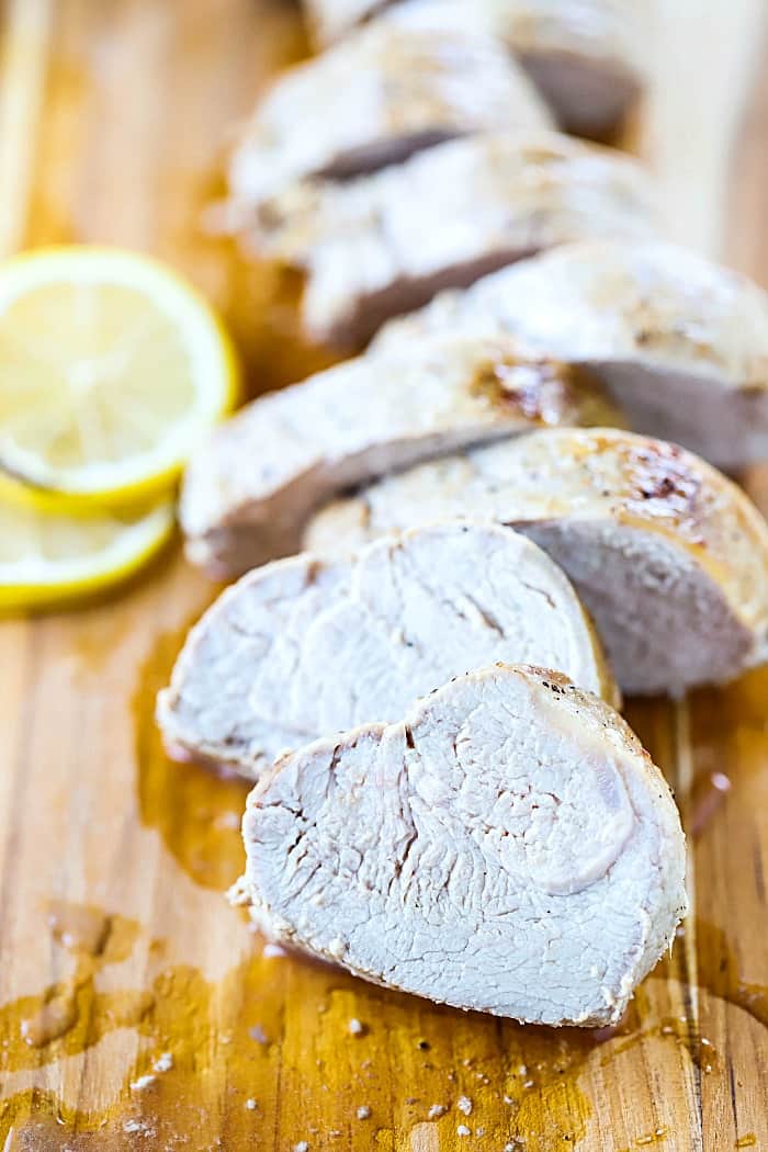 This easy baked pork tenderloin recipe is marinated then baked and served with a tasty sauce made from the marinade. It's a delicious dinner recipe the whole family will enjoy!