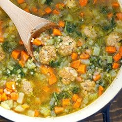 We can't get enough of this Italian Wedding Soup Recipe! It's quick, easy and absolutely delicious!