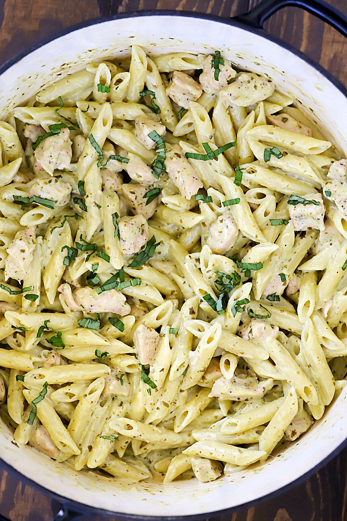 If you love pesto and pasta, you will devour this Creamy Chicken Pesto Pasta Recipe! It's so quick and easy to make, only has a couple of ingredients and tastes amazing!