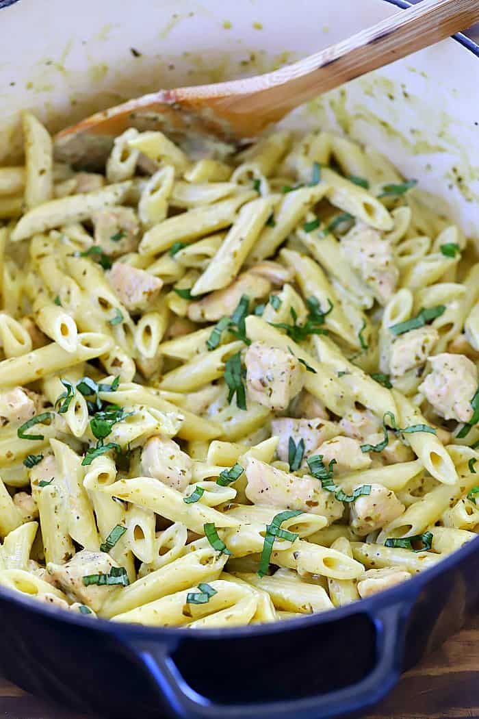 Do you love pesto and pasta?? I do! This Creamy Chicken Pesto Pasta Recipe puts two of my favorite things together into one dinner recipe! 