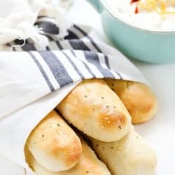 These Easy Homemade Breadsticks are SO good! Serve as a yummy side dish with any meal!