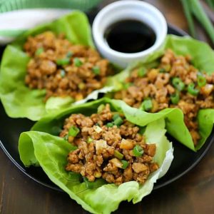This Chicken Lettuce Wraps Recipe is seriously SO yummy! The chicken filling has delicious Asian inspired flavors with a little added crunch from the water chestnuts. This low carb recipe is great for an appetizer or a main dish.