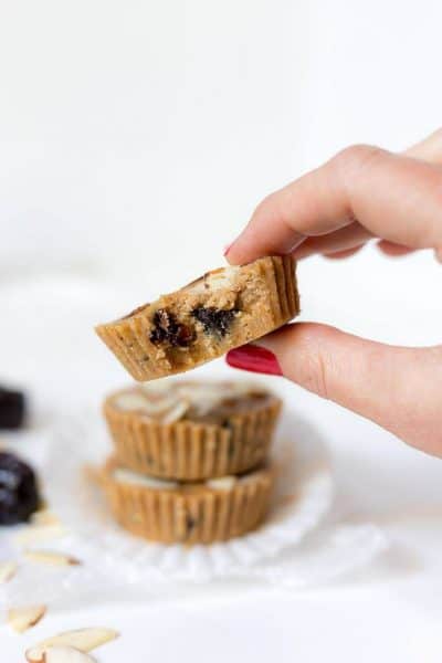 Three Prune Almond Butter Cups and a close up on one bitten in half + 43 Healthy Snack Ideas