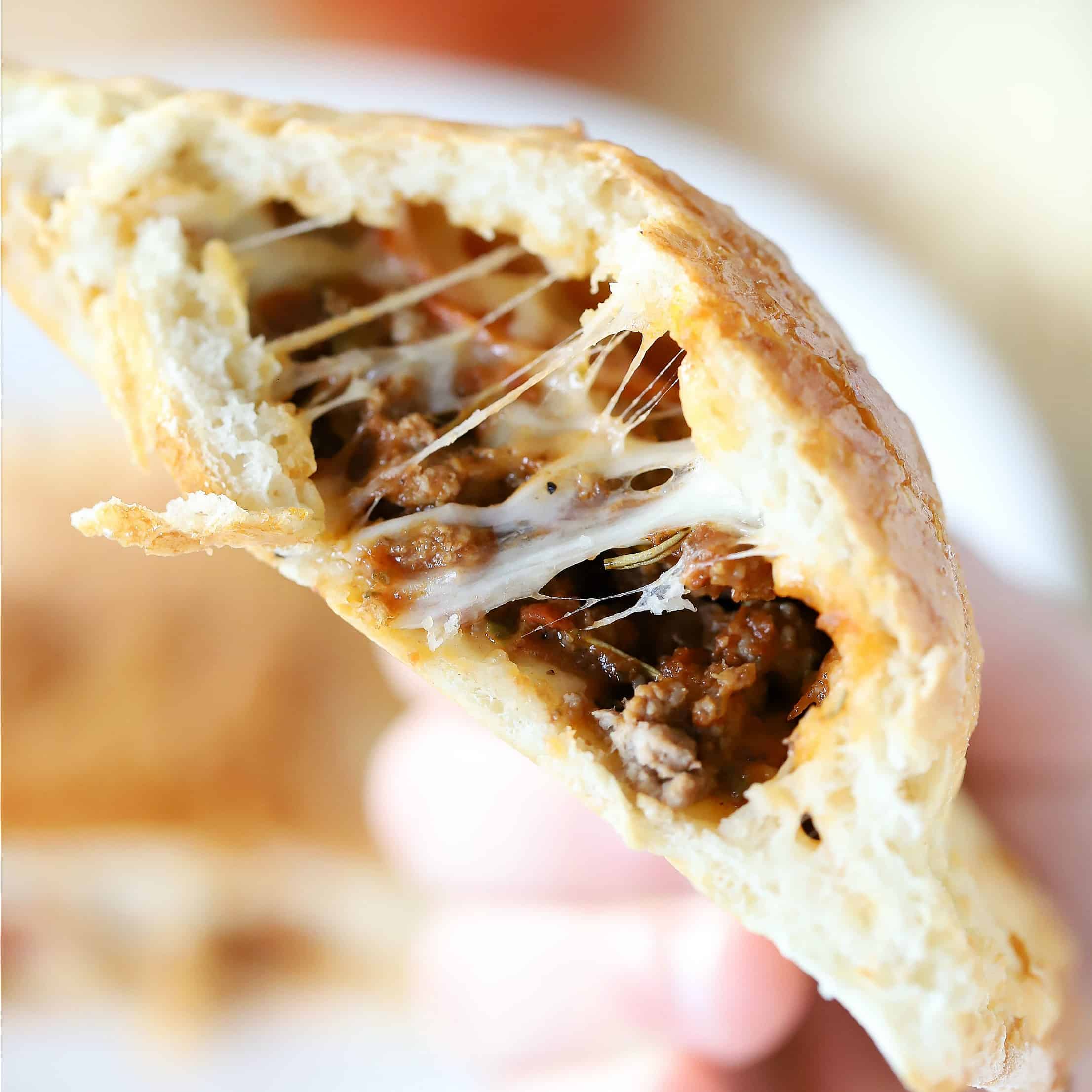 Ooey gooey cheesy pizza pocket center. Filled with round beef, pepperoni and melty cheese. #ad