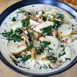 Cropped photo - Bowl filled with Zuppa Toscana Soup.