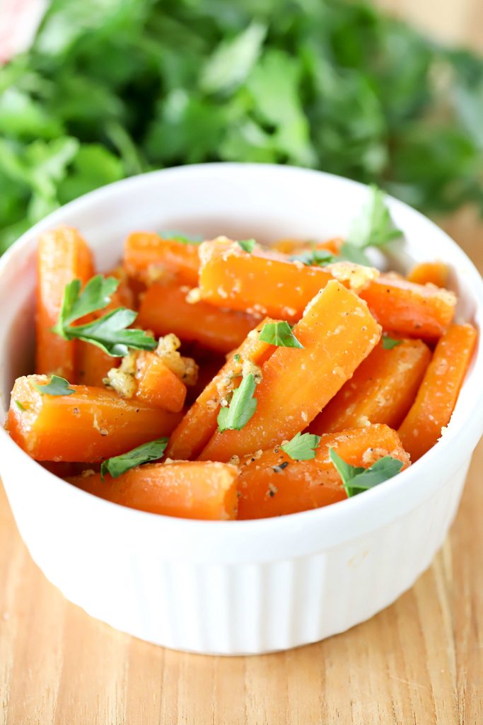 Bowl filled with glazed carrots.