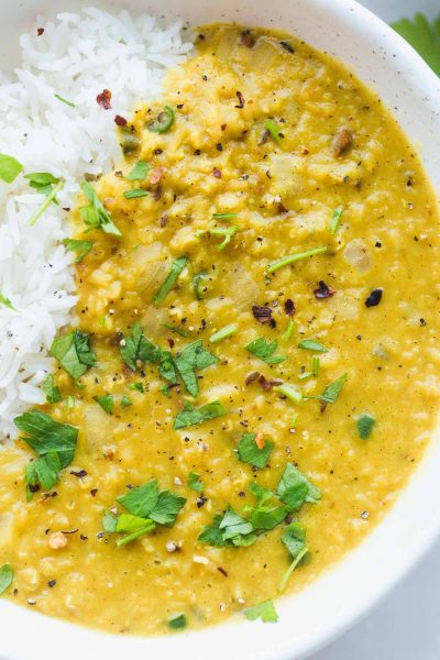 Lentil Dahl Recipe with white rice in a bowl.