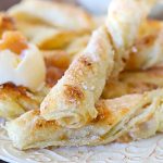 Apple Strudel Twists with a side of vanilla cream.